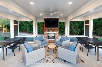 Summerhouse with fireplace, tv, and grills